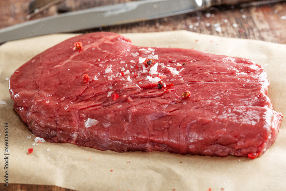 Fresh meat on old board on paper Fresh meat on old board on paper