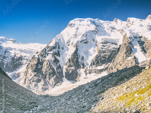Peaks Mizhirgi East (4927 m) and Mizhirgi West (5025 m) of the Northern Massif of the Main Caucasian Range