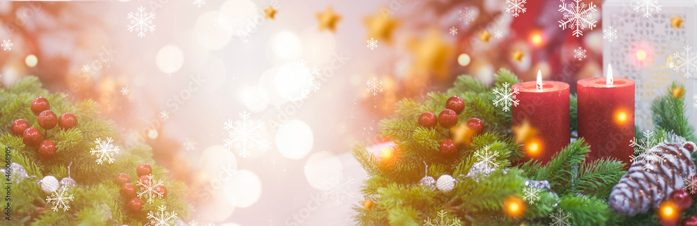 Fototapeta New Year banner with fir branch and festive lanterns, bokeh. New Year, 2022. Light snowy background, snowflakes, lights. Winter festive abstract background.
