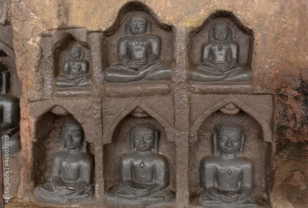 Carved idols of Digambar Jain Tirthankaras on the rock of Mangi Tungi, Nashik, Maharashtra, India.
