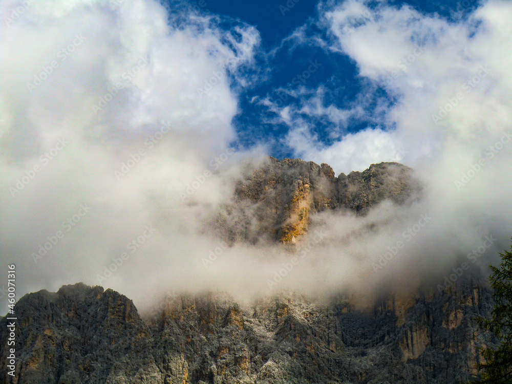 Fototapeta premium Rosengarten also called Catinaccio mountain range in the Dolomites of South Tyrol (Alto Adige) during autumn. The Vajolet Towers and the rock face of mount Laurin Wand. The Rosengarten is part of the 