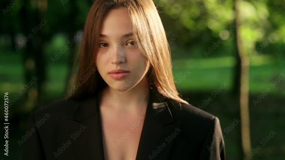 Portrait Wonderful Mixed race woman with a lovely look and natural make up looking at camera and the wind moving her hair. Portrait of gorgeous girl Portrait Wonderful Mixed race woman with a lovely look and natural make up looking at camera and the wind moving her hair. Portrait of gorgeous girl