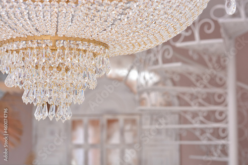 Beautiful crystal chandelier close up in the room