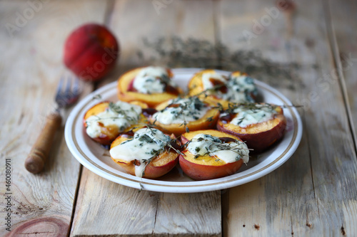 Baked peaches with dor blue cheese. Healthy food. The keto diet. Vegetarian snack.