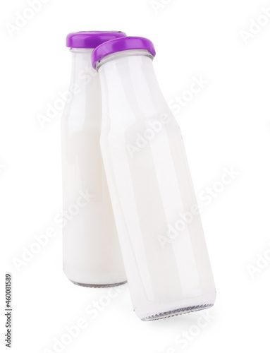 Pitcher of milk isolated on white background. Clipping path. Glass jug
