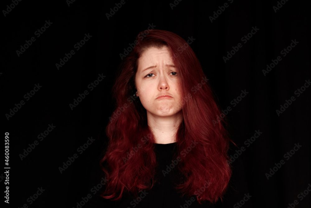 Emotions. Portrait of a plaintive young woman Emotions. Portrait of a plaintive young woman