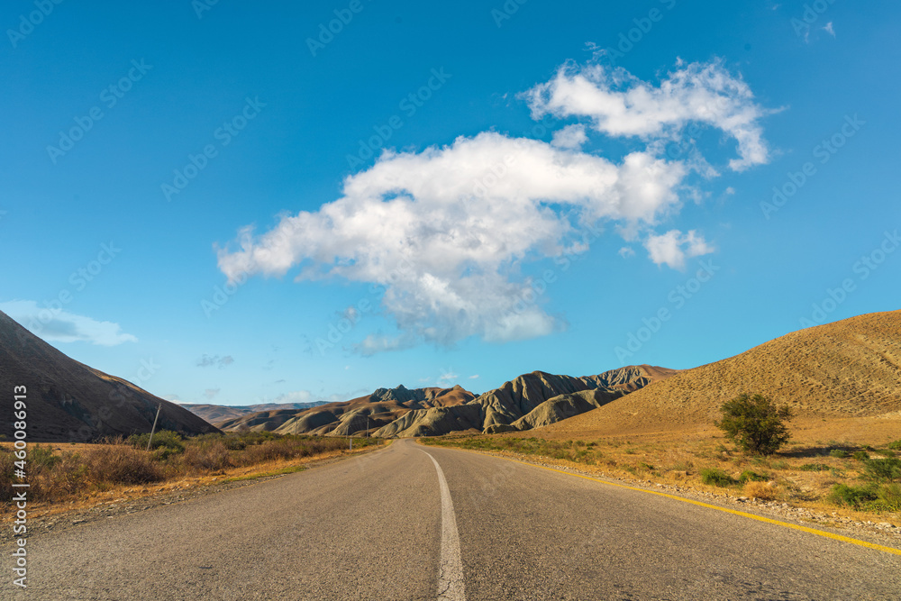 Asphalt road in mountainous terrain