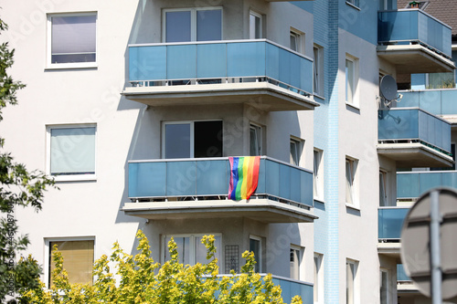 Flag on the balcony with a symbol of lesbian, gay, bisexual, transgender 