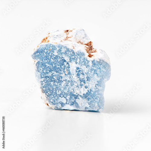 Blue calcium sulfate mineral rock isolated on white background. Angelite photo