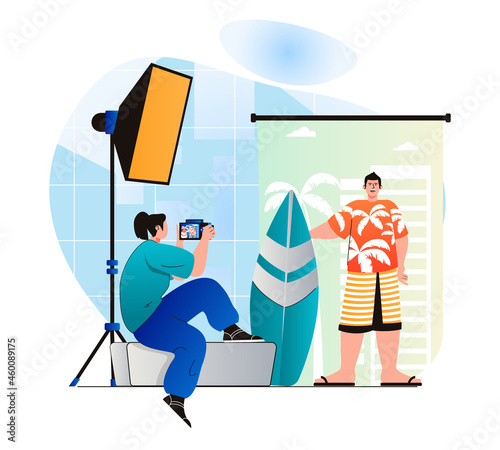 Photo studio concept in modern flat design. Woman with photo camera makes photoshoot for posing surfer man. Photographer working in professional salon with lights equipment. Vector illustration