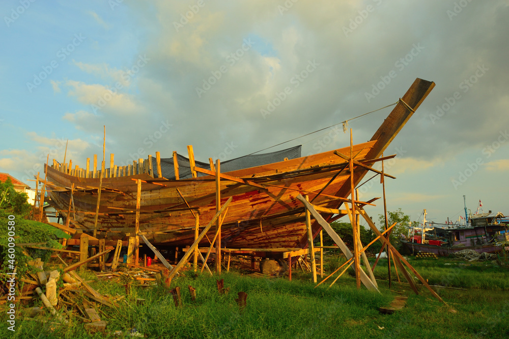 Wooden fishing boat construction on Kluwut river, Brebes, Central Java