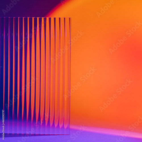 Colorful gradient background with ribbed acrylic plate