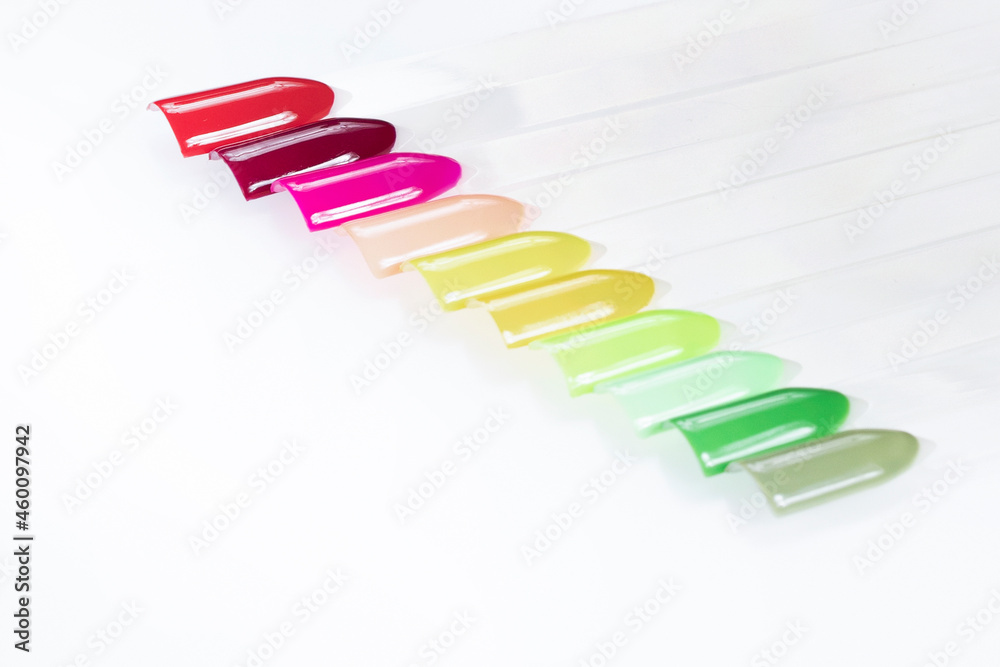 Multiсolor nail tips on a white background. examples of manicure for nails. Palette with color samples of nail. Copy space Multiсolor nail tips on a white background. examples of manicure for nails. Palette with color samples of nail. Copy space