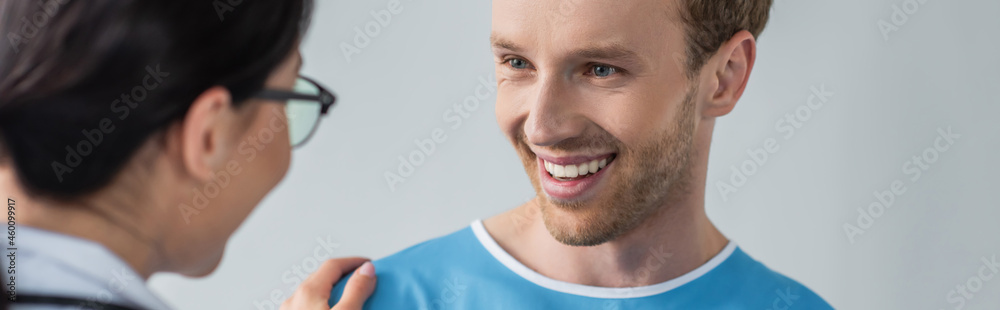 happy patient looking at doctor in glasses, banner happy patient looking at doctor in glasses, banner