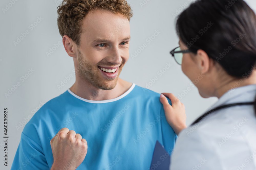 excited patient looking at doctor in glasses excited patient looking at doctor in glasses