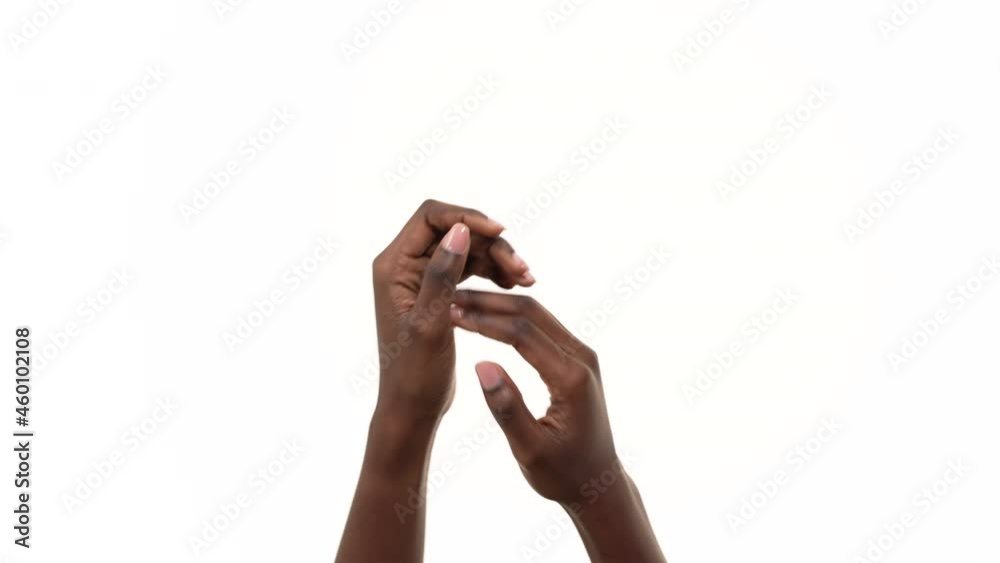 Close up of a black man clapping his hands. Isolated on a white background.