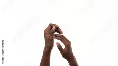 Close up of a black man clapping his hands. Isolated on a white background.