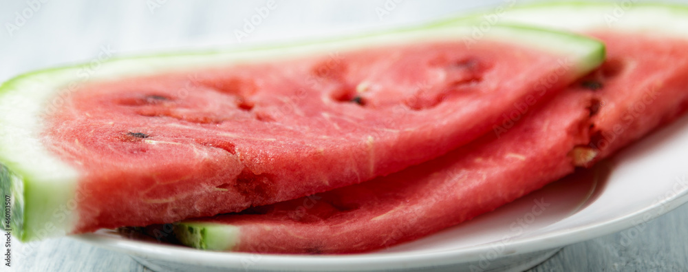 Waterelon, honey watermelon on wooden table background.