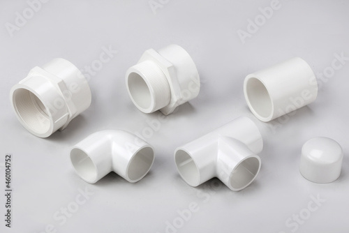 UPVC  CPVC Fittings for polypropylene pipes. Elements for pipelines. plastic piping elements. They are designed for connecting pipes. Concept sale of polypropylene fittings. photo