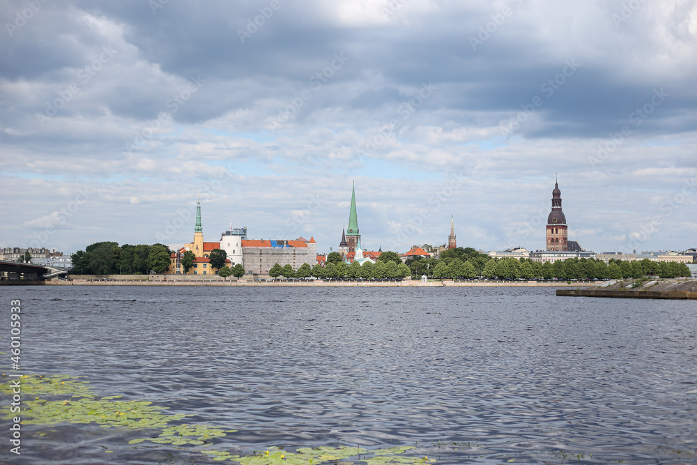Cityscape view of old Riga buildings near river Daugava.
