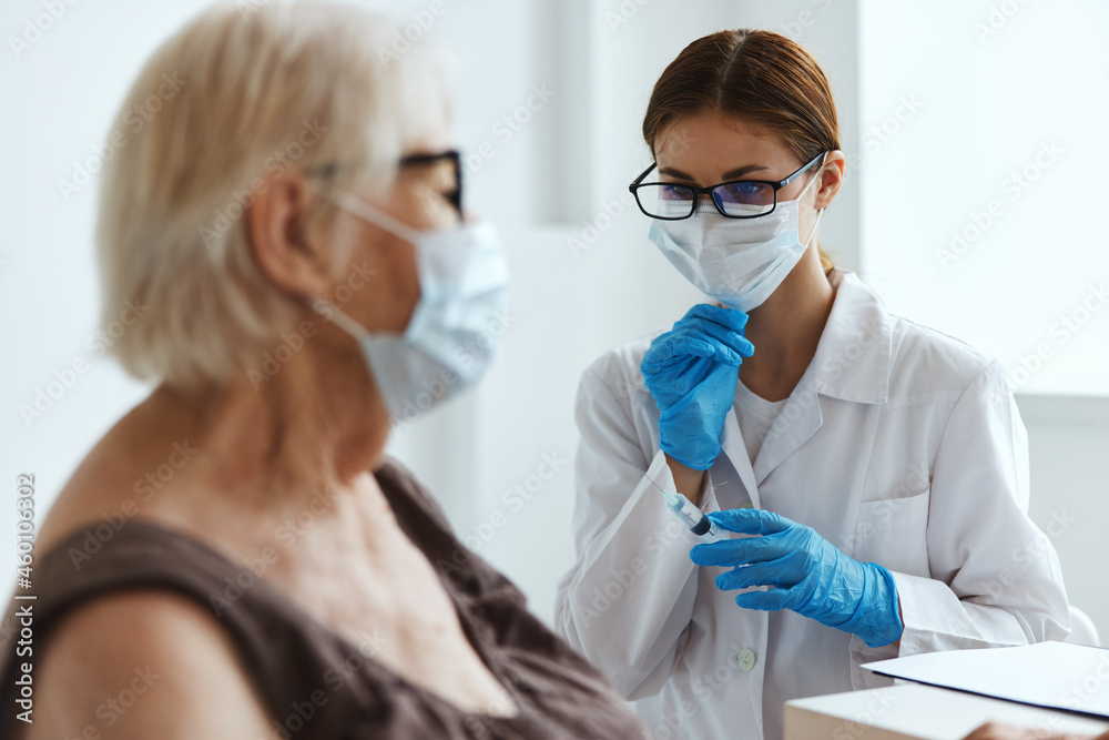 medical mask nurse vaccination of an elderly woman vaccine passport medical mask nurse vaccination of an elderly woman vaccine passport