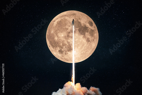 Successful rocket launch into space on the background of a full moon with craters and stars. Spaceship shuttle lift off into outer space, start of space mission concept photo