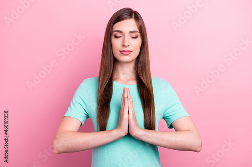 Photo of charming adorable young lady wear teal t-shirt smiling arms together closed eyes isolated pink color background