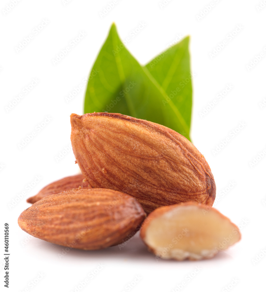 Group of almonds with leaves isolated on white background Group of almonds with leaves isolated on white background
