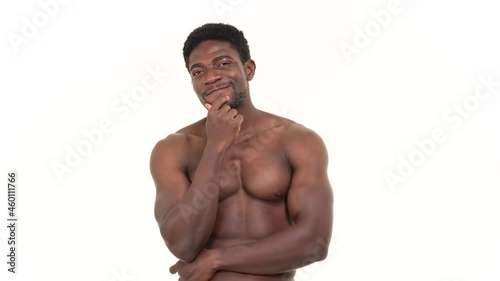 Portrait of a muscular black man flirting to camera. Isolated on a white background.