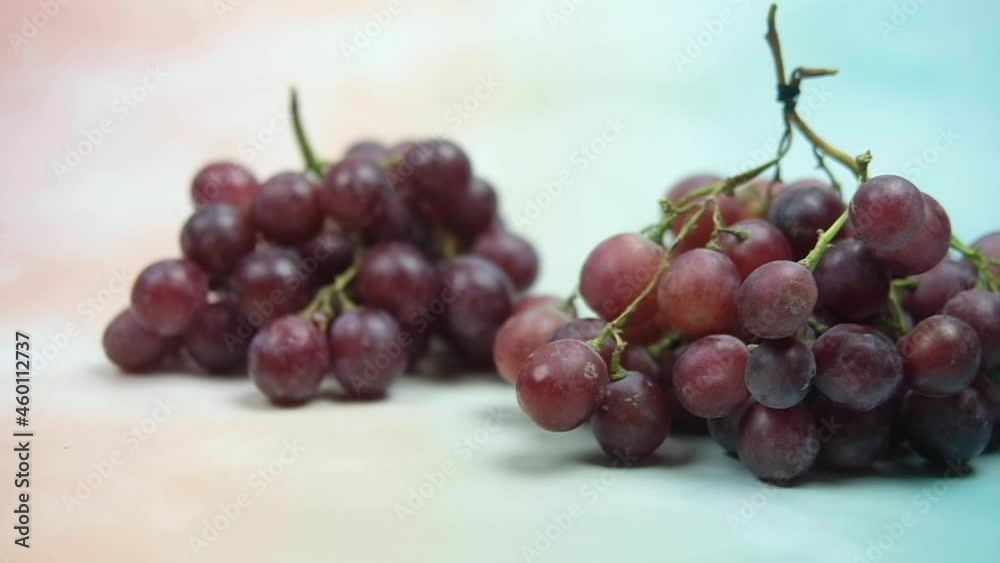 Panning and slow motion shot of fresh seedless grapes. Panning and slow motion shot of fresh seedless grapes.
