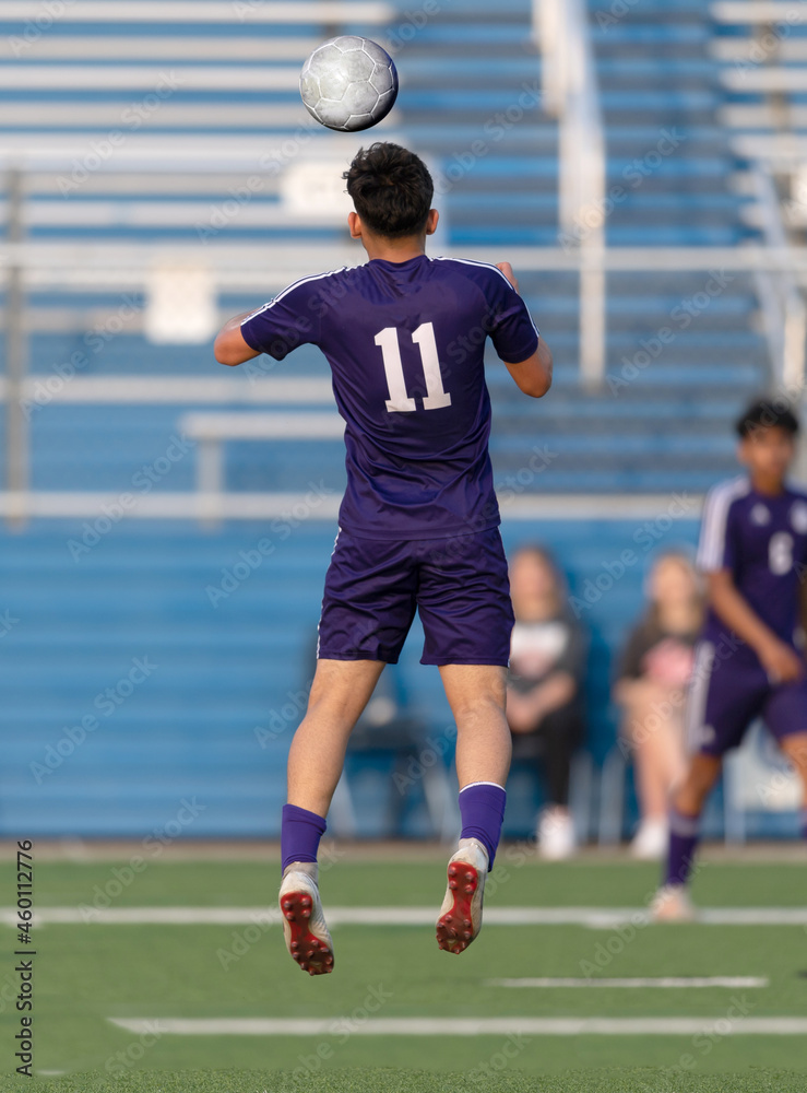 Athletic boys making exciting plays during a soccer game Athletic boys making exciting plays during a soccer game