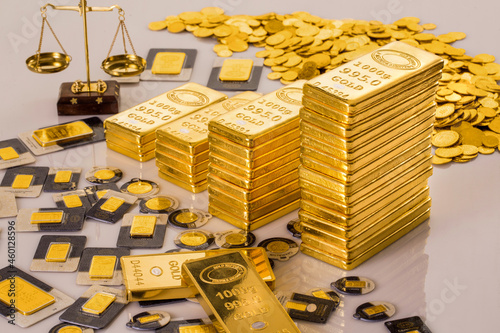 Gold Bullions with gold coins photo