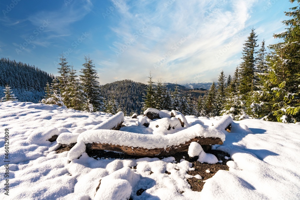 Buried snow-coveredsite for hiking in the mountains i bright cold sun Buried snow-coveredsite for hiking in the mountains i bright cold sun