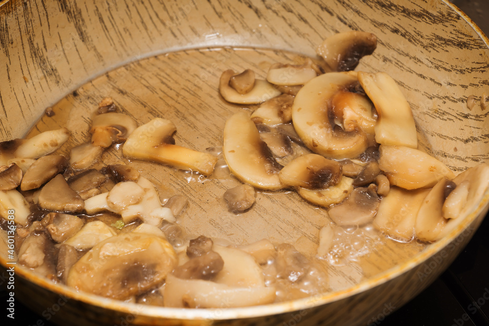 Fototapeta premium fresh mushroom julienne is cooked