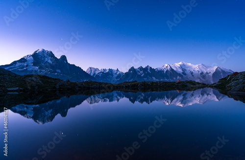 Dawn at Lac des Cheserys, with some stars still in the sky over Mont Blanc.