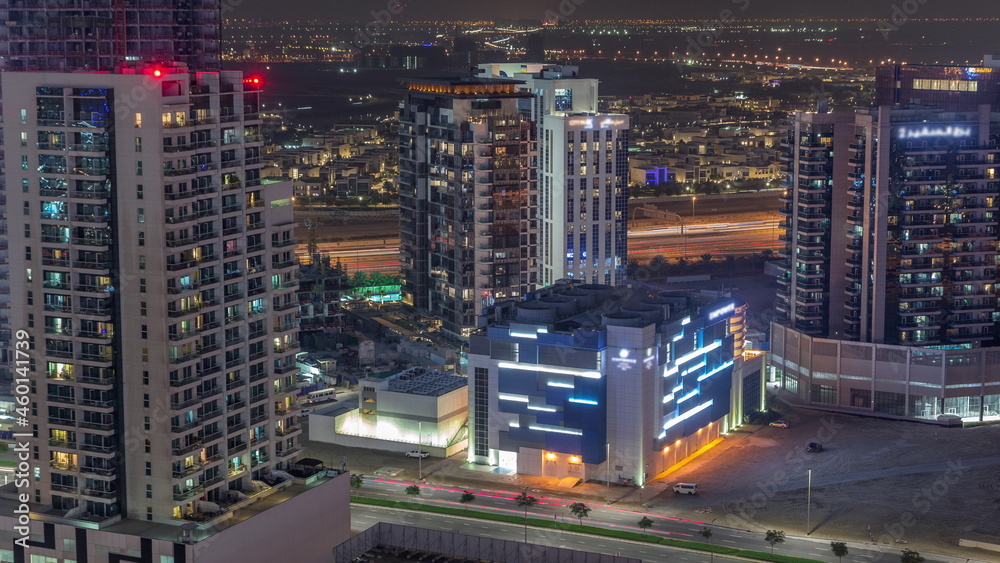 Skyscrapers at the Business Bay aerial night timelapse in Dubai, United Arab Emirates