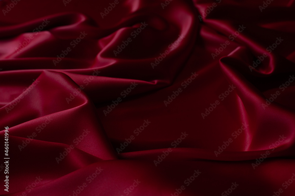 Obraz premium Red smooth cloth folds texture background