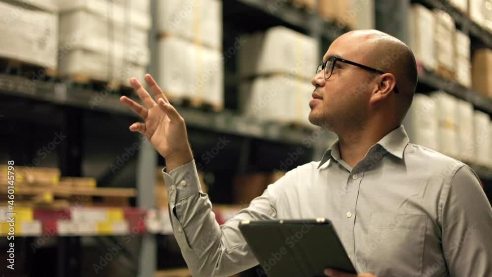 Supply chain. Young manager worker checklist manage parcel box product in warehouse. Asian supervisor man using tablet working at store industry. Logistic import export Distribution warehouse.