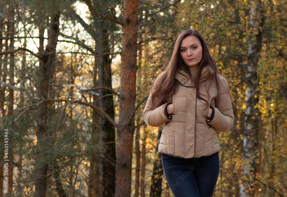 portrait of a girl in the autumn forest