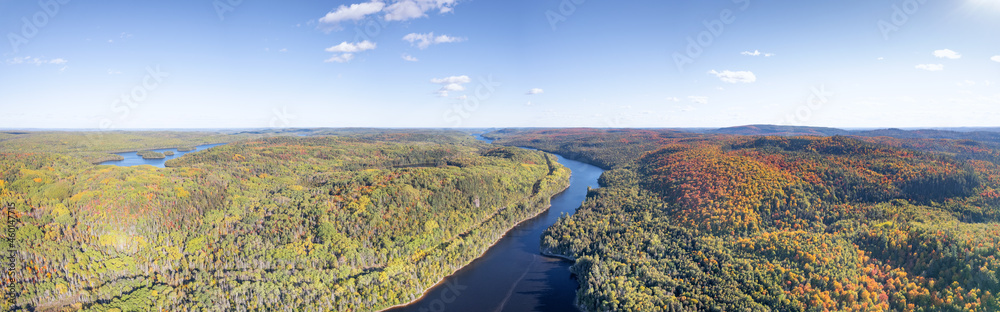 Aerial view of the Montreal river and landscape in autumn