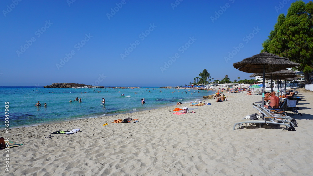 cyprus beach straw umbrellas sun loungers recreation garden resort summer
