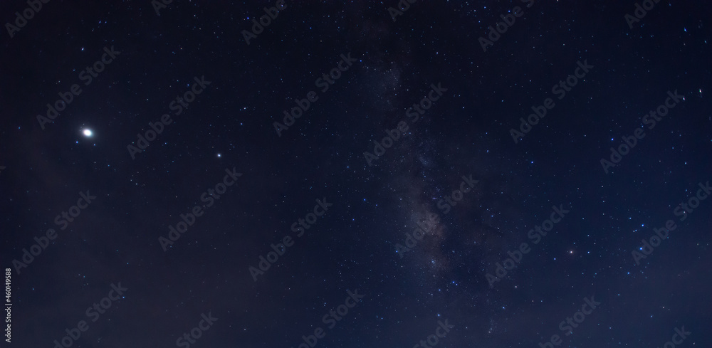 Panorama blue night sky milky way and star on dark background.Universe filled with stars, nebula and galaxy with noise and grain.selection focus.amazing