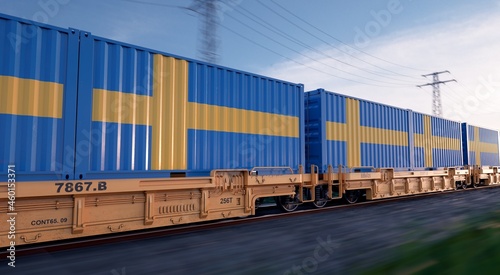 Swedish export. Running train loaded with containers with the flag of Sweden. 