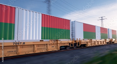 Madagascarians export. Running train loaded with containers with the flag of Madagascar. 