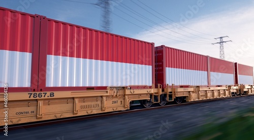 Indonesian export. Running train loaded with containers with the flag of Indonesia. 