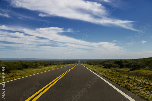 Straight road centered in the Patagonian steppe of Chubut  Argentina