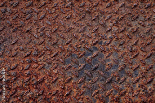 Black color non-slip metal with red rust textured background, Rust of metals.Corrosive Rust on old iron 