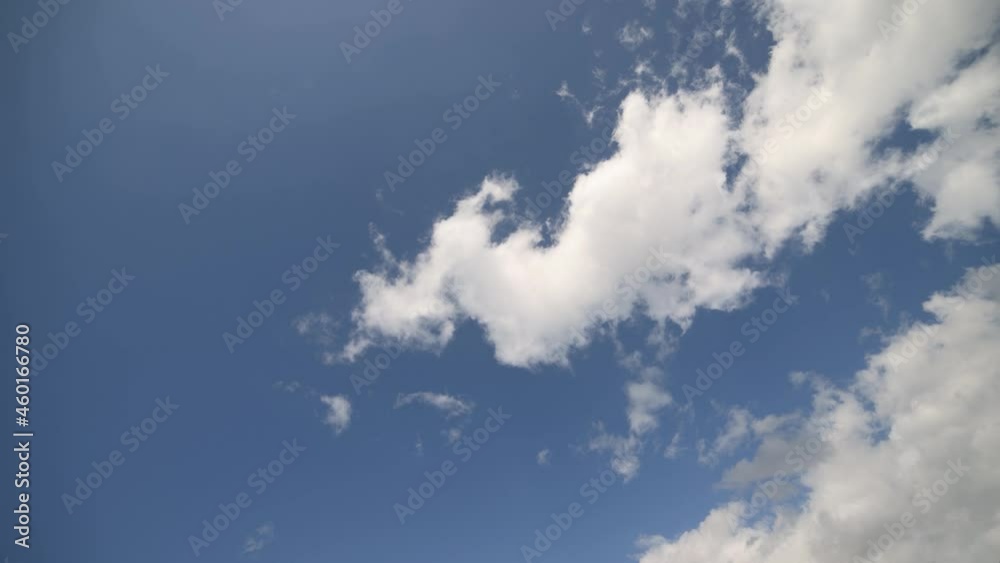 timelapse video with white clouds running on blue sky. cloudscape with pure white cumulus clouds timelapse video with white clouds running on blue sky. cloudscape with pure white cumulus clouds