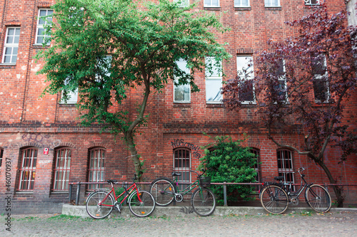 Bicycle parking near the old red brick building