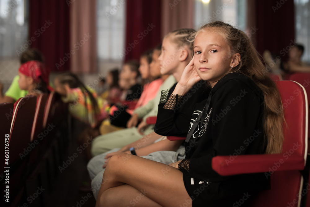 Children watching movie in cinema